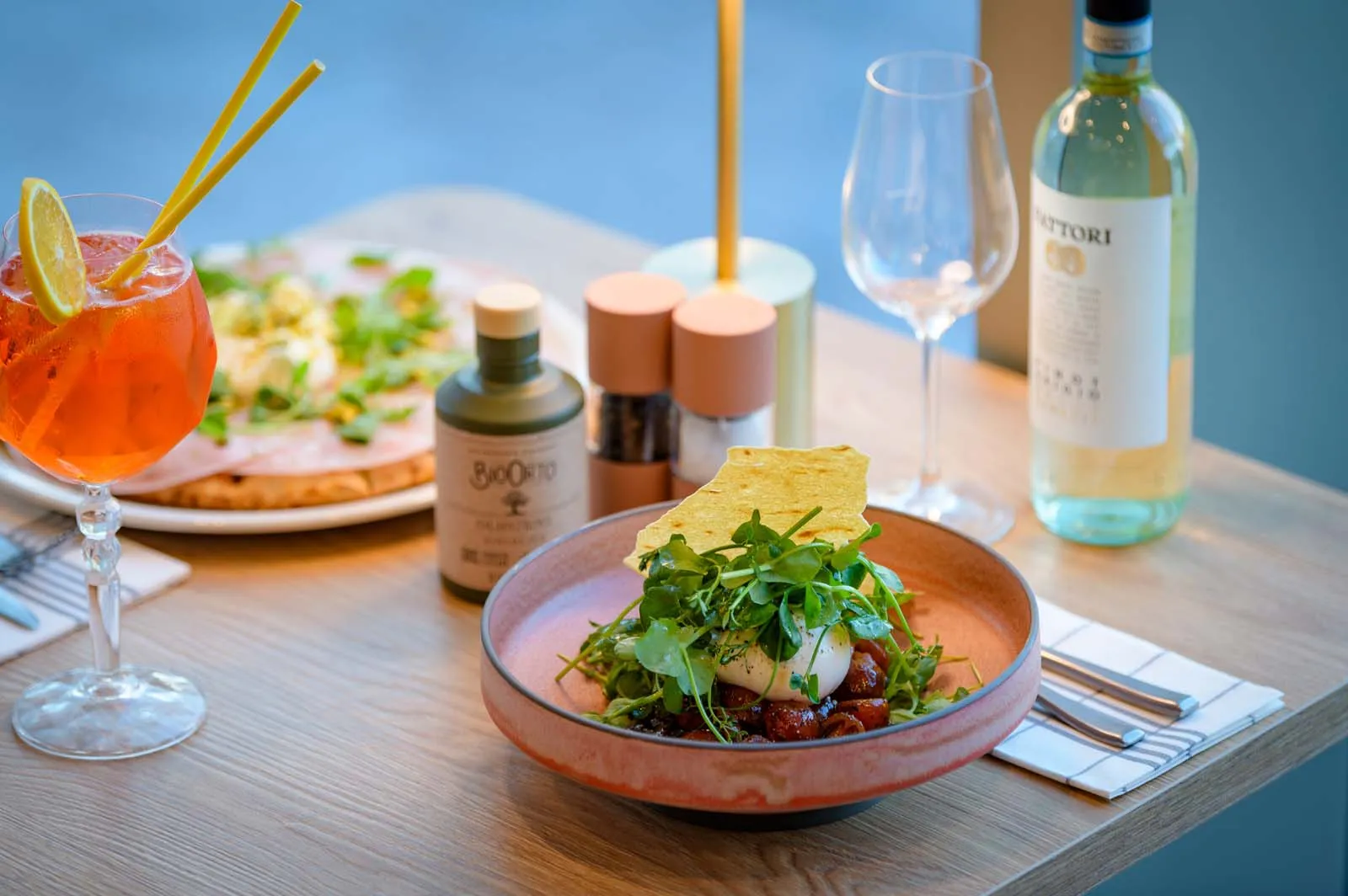 Salad with dressing and a cocktail